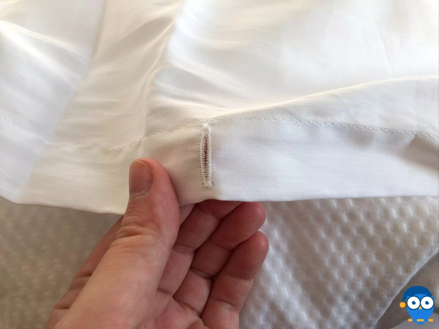 DreamCloud bedding button holes