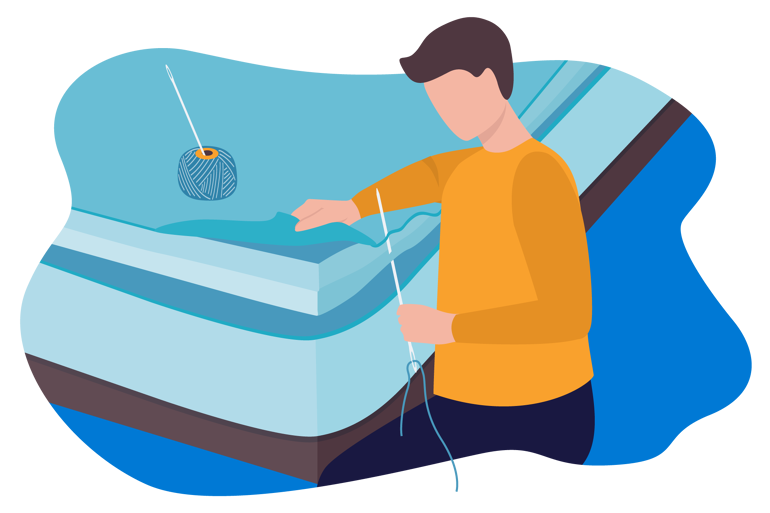 Man stitching the mattress by hand